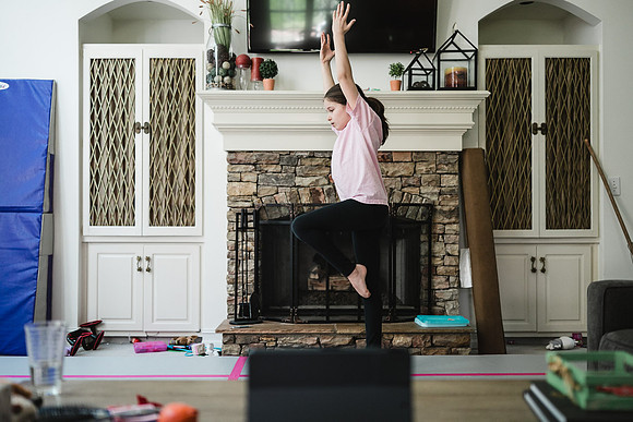 girl doing a gymnastics zoom workout during the quarantine