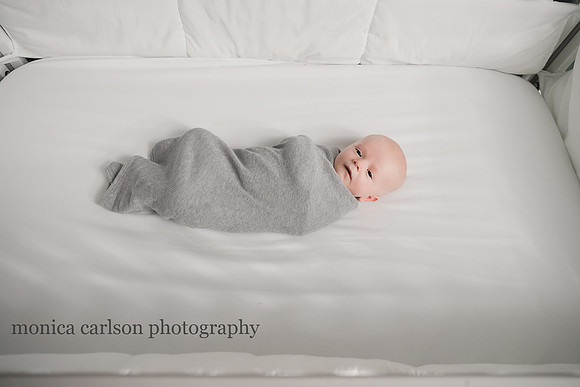 newborn baby in his crib