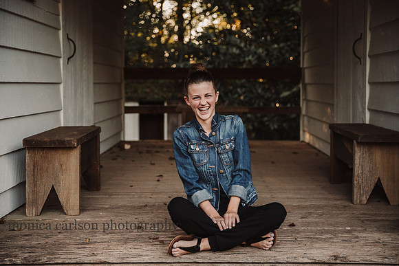 teen girl laughing in a portrait by monica carlson photography