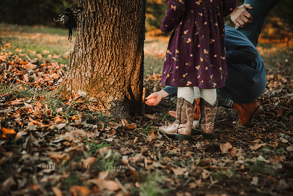 little girls opening a door in fairy garden