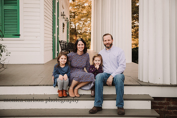 family of four siitting on the patio at Barrington hall