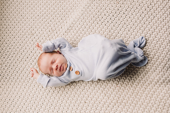 portrait of a baby stretching by monica carlson photography