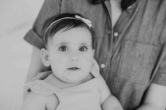 black and white portrait of a six month old girl