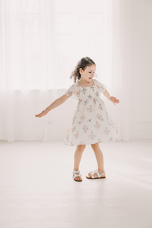 Girl dancing in a photo studio