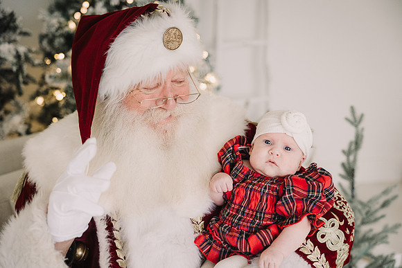 sewll family with Santa by monica carlson photography