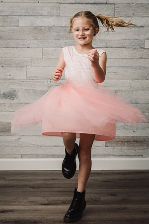 girl twirling with a tulle skirt