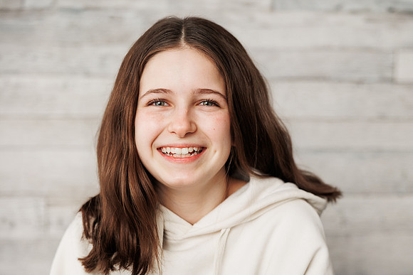 teen girl smiles during a personality portrait session
