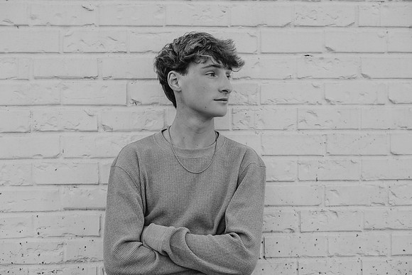 portrait of a high school senior looking away from camera