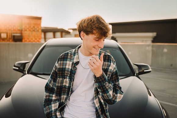 Happy high school senior at sunset during a photo session in Alpharetta, Georgia